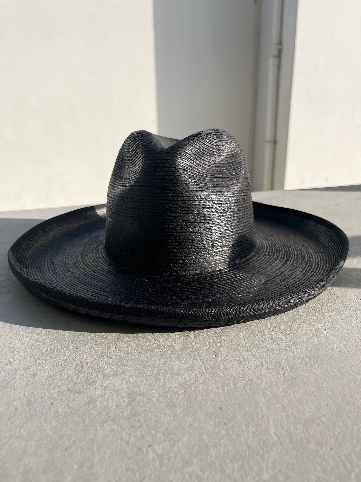 The Palm Pencil Roll Hat in Charcoal (blk), Sedona (caramel) & Joshua (desert white)