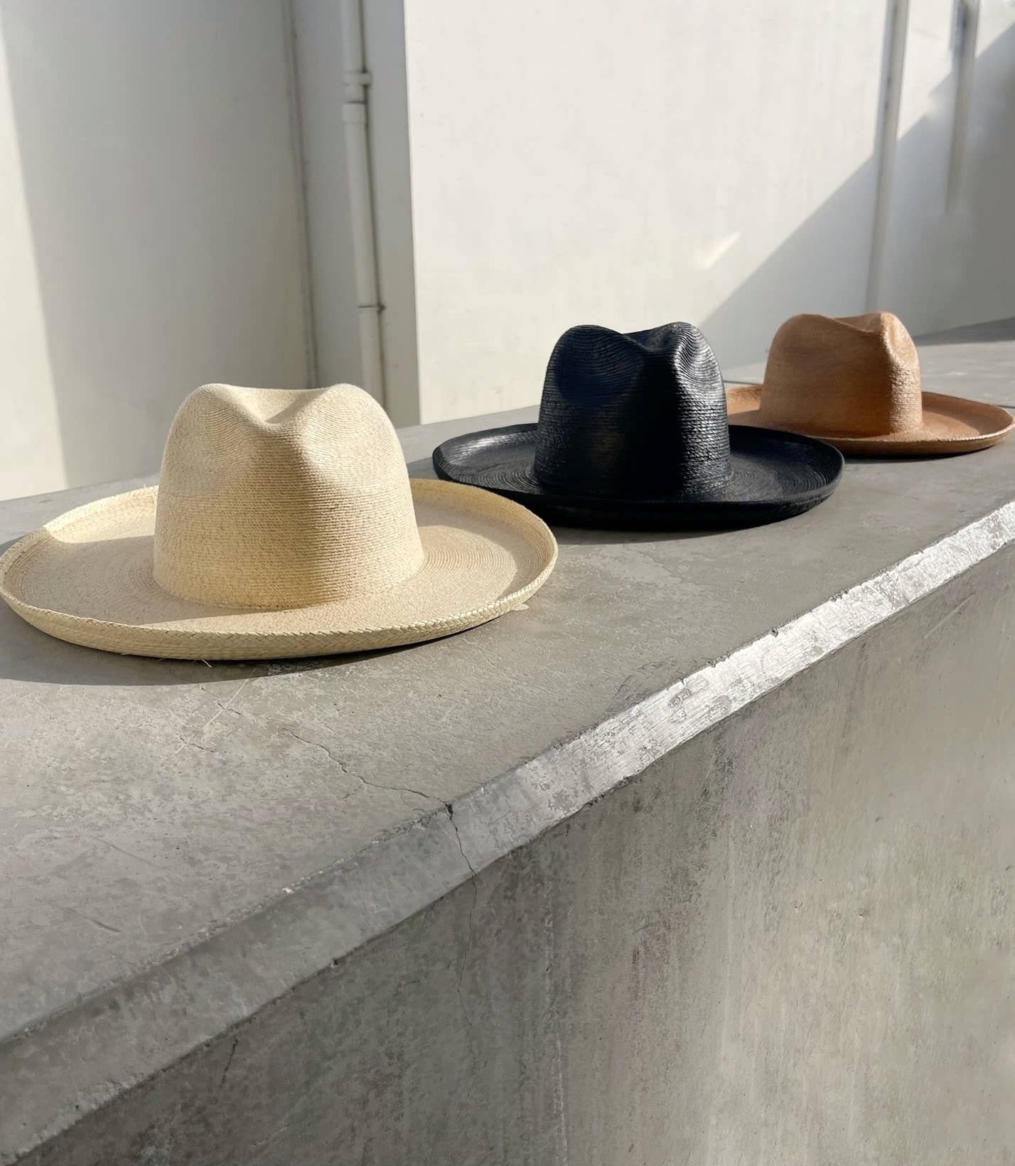 The Palm Pencil Roll Hat in Charcoal (blk), Sedona (caramel) & Joshua (desert white)