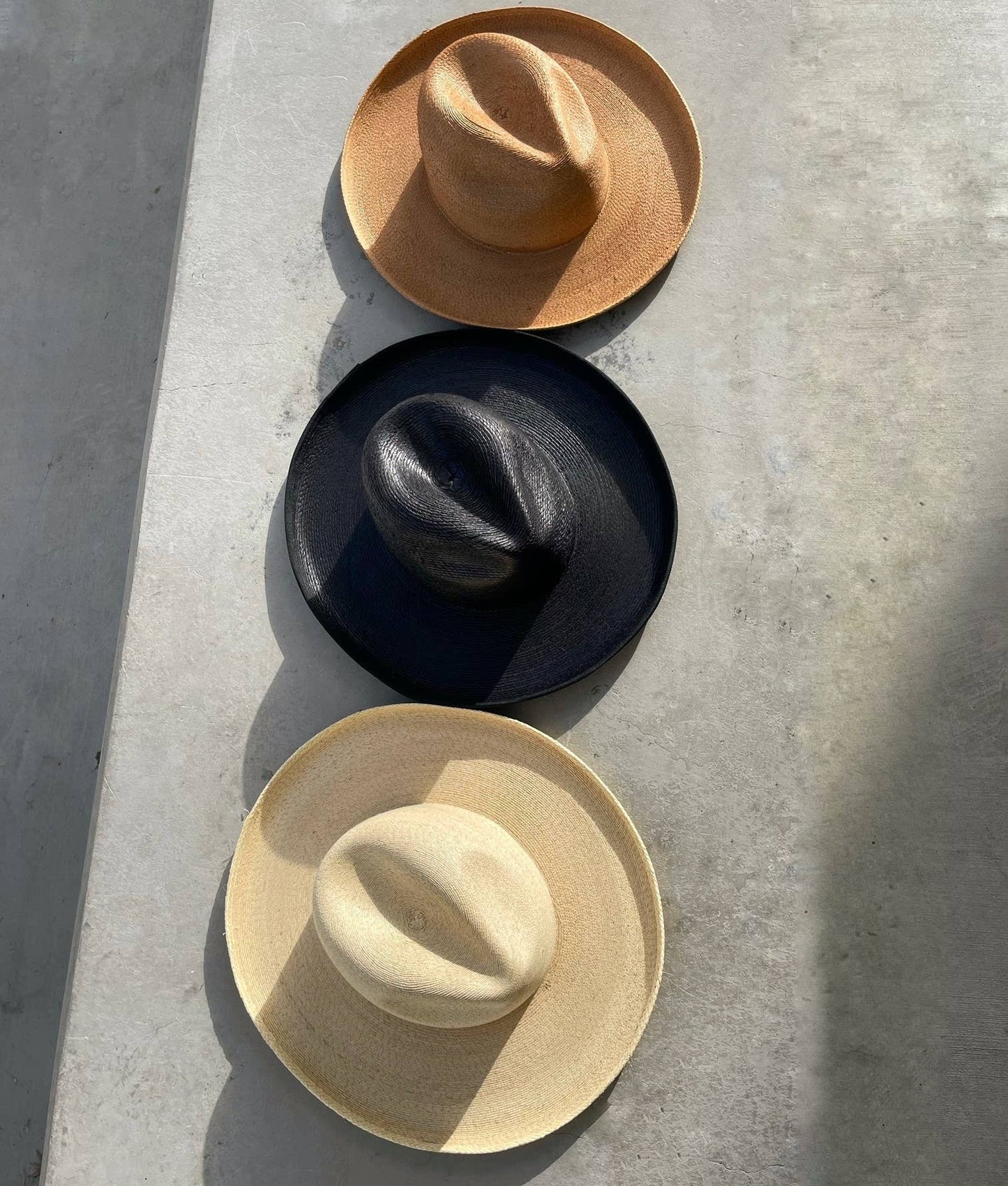 The Palm Pencil Roll Hat in Charcoal (blk), Sedona (caramel) & Joshua (desert white)